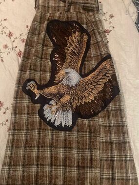 Dressed in LALA Brown Plaid Maxi Skirt with Embroidered Eagle Patch